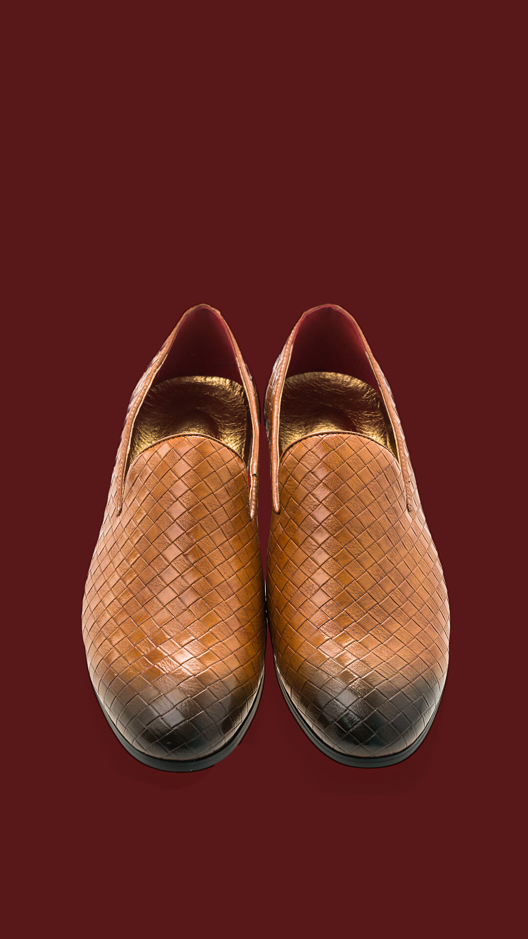 A pair of tan leather slip-on shoes, ideal accessories to complement traditional kurta outfits